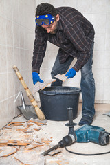 worker collects fragments of tile