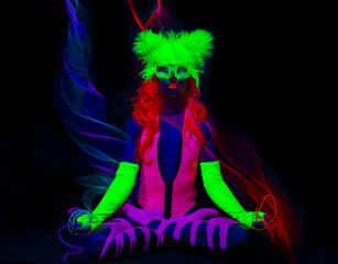 yoag insturtor in flurosecent costume