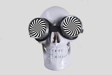 skull wearing hypnotic sunglasses