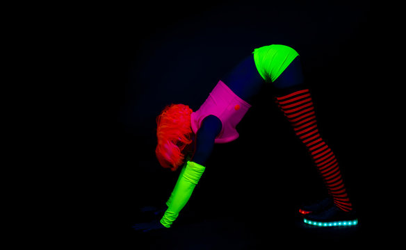yoag insturtor in flurosecent costume