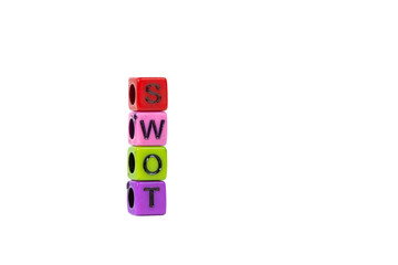 SWOT text made from colorful beads or letter bead on white background, finance and business concept.