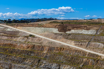 Dirt road down to the bottom of limestone mine