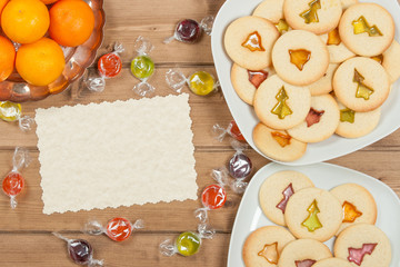 Home Baked Crystal Cookies On White Plates. Oranges, Clementines.