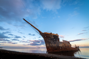 An old shipwreck on beach