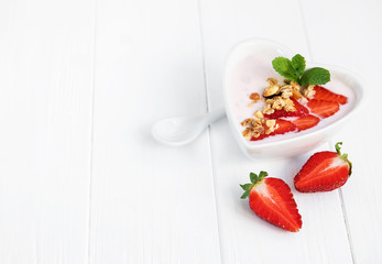 Bowl with strawberry yogurt