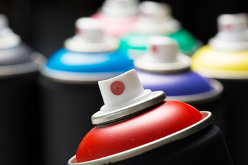 Spray paint cans close up
