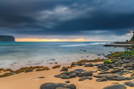 Sunrise Seascape with Threatening Storm Clouds