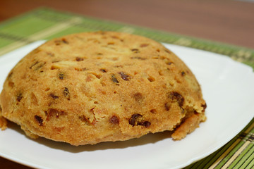 Spotted dick is a British pudding, made with suet and dried fruit, usually currants and raisins.