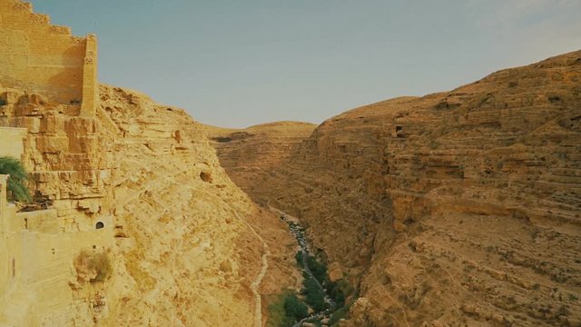 Kidron river valley. Panorama viewed from terrace of Greek Orthodox monastery The Great Lavra of St. Sabbas the Sanctified (Mar Saba) in Judean desert. Palestine, cca. 2015