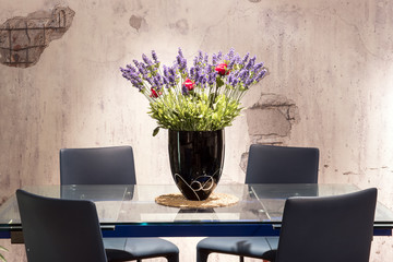 Dining table with floral centerpiece