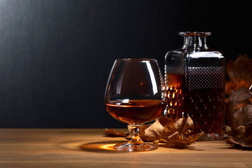 Brandy and dried up oak leaves .
