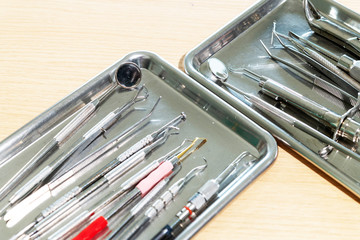 Dental tools and syringe at dentist's surgery