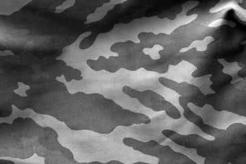 Camouflage cloth with blur effect in black and white.