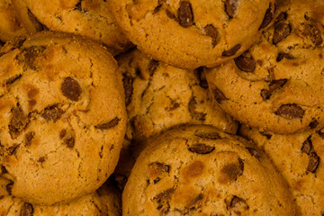 Pile of the fresh chocolate chip cookies for background