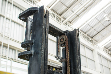 Forklifts in warehouse.