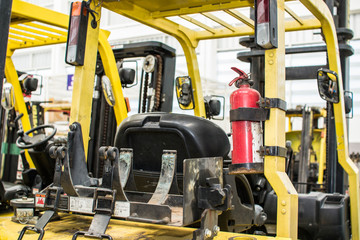 Forklifts in warehouse