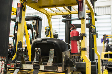 Forklifts in warehouse