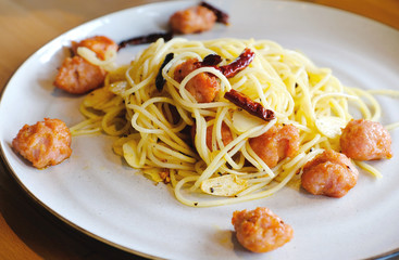 sausage italian spaghetti on white dish