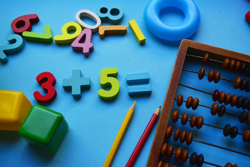 colorful numbers on a blue background, kids learn arithmetic