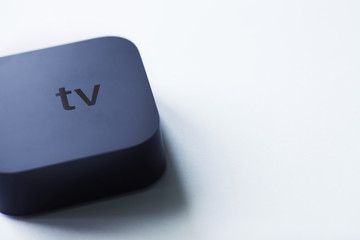 Remote control devices concept. Set of controller and micro console for TV watching and online streaming. Top view. Space for a text. Close up.