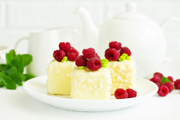 Chocolate cake with walnut glaze on a black background.