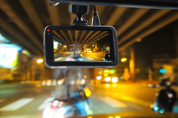CCTV car camera for safety on the road accident on abstract blurred bogey light of city in night...