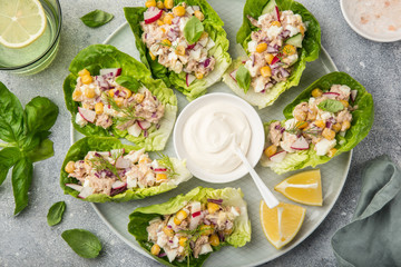 tuna salad lettuce wraps  on white plate - obrazy, fototapety, plakaty
