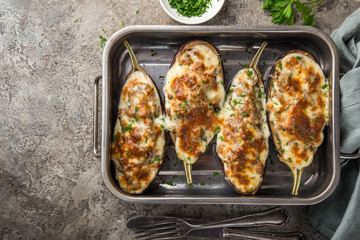 stuffed eggplant with meat, vegetable and cheese