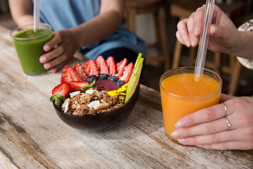 woman eating fruit salad