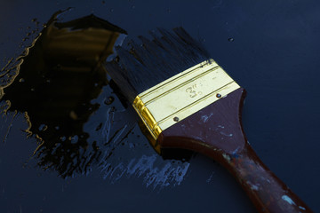 paint brush with black paint