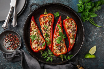 bell peppers stufed with pearl couscous and vegetables - obrazy, fototapety, plakaty