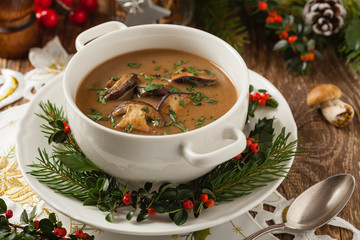 Traditional mushroom soup, made from porcini mushrooms. Christmas decoration.