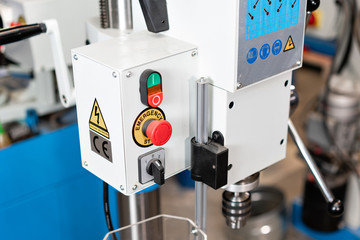 New Industrial Iron drill in workshop interior. Closeup on the drill. Tool store or exposition...