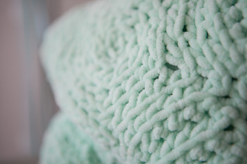 Knitted mint color item close up