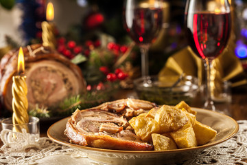 Obraz na płótnie Canvas Traditional italian porchetta on festive table