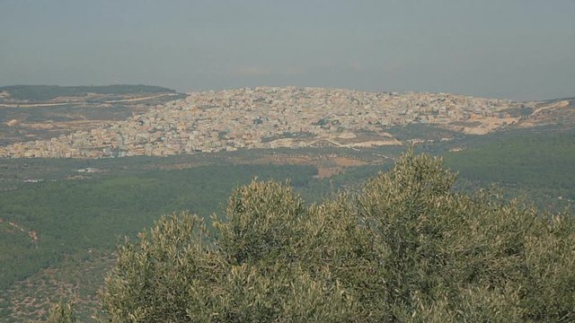 Palestinian city near Nazareth. View from Mount Hermon.
Lower Galilee - Israel, cca 2015.