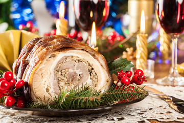 Traditional italian porchetta on festive table