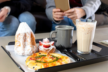 Coffee cafe in South Korea always sells delicious desserts such as cake, bread, truffles, pies and sandwich to eat with coffee and iced tea for breakfast, brunch, lunch or dinner. 