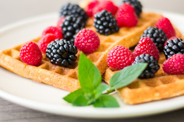 Golden waffles with seazonal fruits (summer dessert)