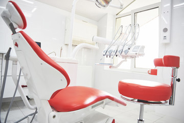 Dental clinic interior, design with chair and tools. All furniture in the same color