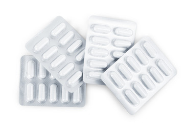 Сapsule pills in blister on a white background