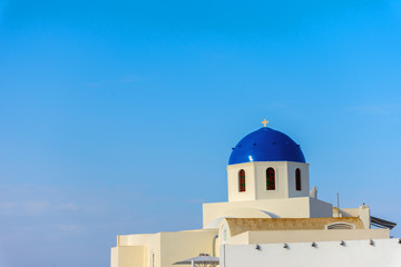 Santorini, Greece. Picturesque view of traditional Cycladic Oia Santorini's church on cliff