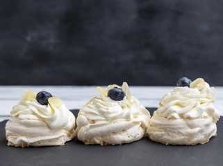 baked round meringues with whipped cream