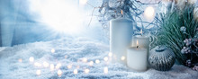 Winter decoration in snow with golden bokeh