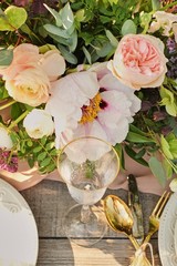 Obraz na płótnie Canvas cutlery, glass, flowers, table setting wedding close-up