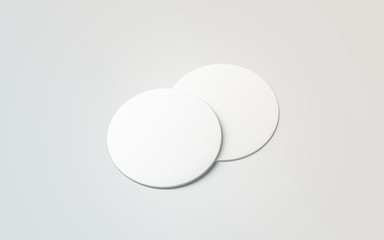 Blank white two beer coasters mockup set, isolated, 3d rendering. Blank round rug for beverage mock up. Empty bottle coaster lying. Circular can mat design.