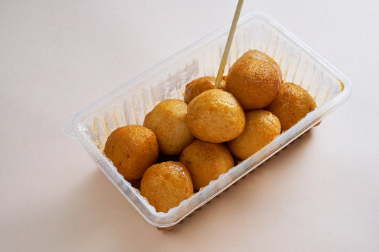 A plastic box of Hong Kong-style curry fish balls