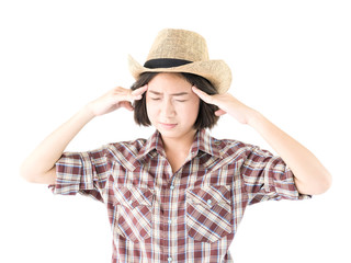 Young woman in a cowboy hat and plaid shirt