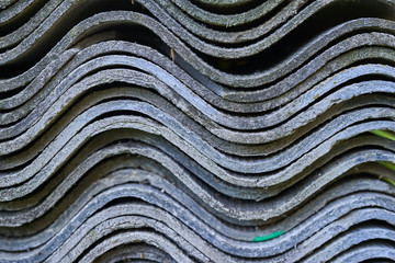 Old grey sheets of slate, piled in stacks