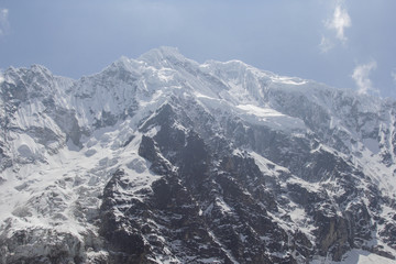 Fototapeta na wymiar View on the top of Salkantay Mountain in cloudy day